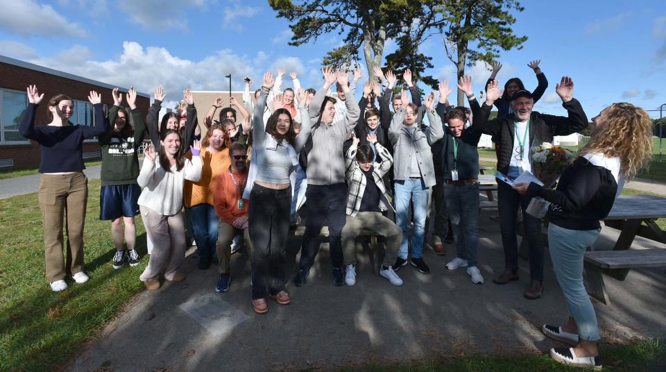 German foreign exchange students join with Dennis-Yarmouth High School students in a cheer to D-Y teacher Rebecca Horn, far right. Horn led a group of students to Germany last April and the German students visited the school this past week and headed off Thursday to visit New York for a few days.