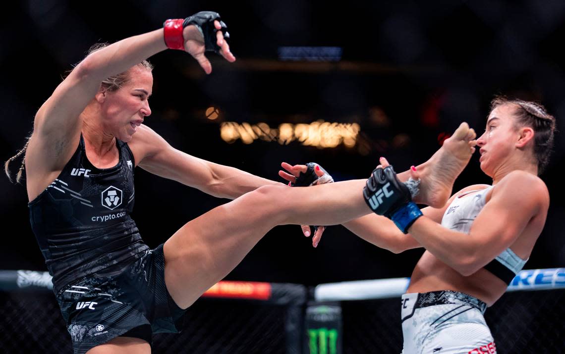 Katlyn Cerminara of the United States fights against Maycee Barber of the United States during their women’s flyweight title match during the UFC 299 event at the Kaseya Center on Saturday, March 9, 2024, in downtown Miami, Fla.