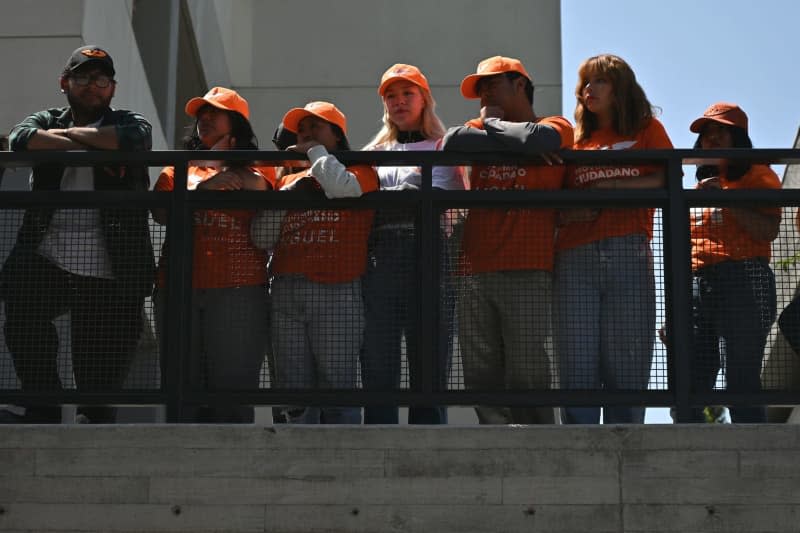 Supporters of Mexican presidential candidate Jorge Alvarez Maynez of the Citizens' Movement Party (MC), attend an election campaign at the CETYS University campus. Carlos A. Moreno/ZUMA Press Wire/dpa