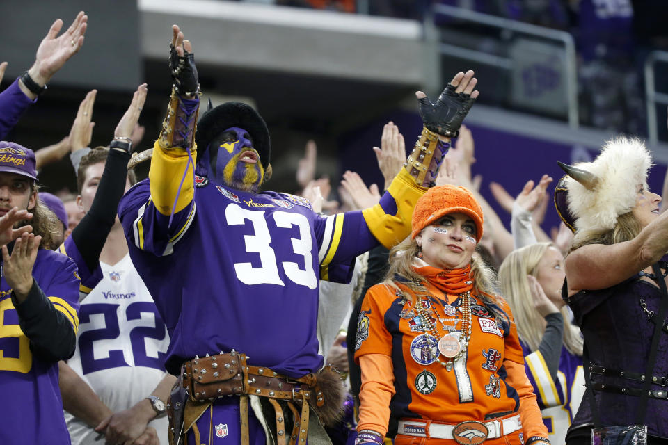 Fans react during the second half of an NFL football game between the Minnesota Vikings and the Denver Broncos, Sunday, Nov. 17, 2019, in Minneapolis. (AP Photo/Bruce Kluckhohn)