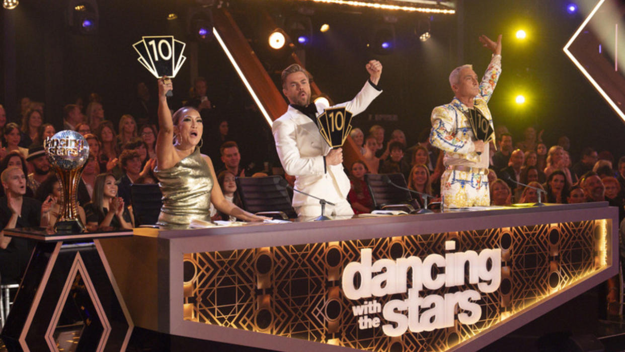  Dancing with the Stars judges Carrie Ann Inaba, Derek Hough, and Brunio Tonioli in Season 32 finale. 