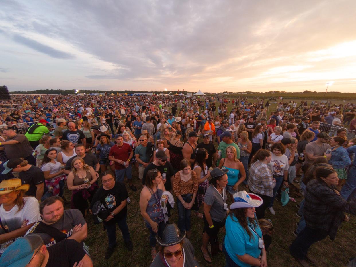 Those attending the Luke Bryan Concert get a view of a spectacular sunset between acts Saturday, Sept. 17, 2022.