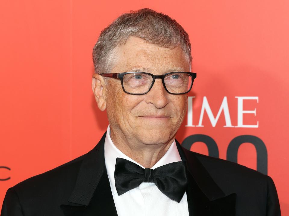 Photograph of Bill Gates wearing a bow-tie and suit whilst smiling