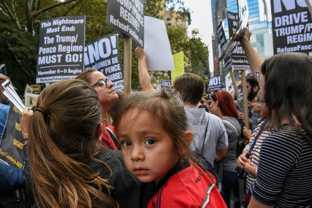 FILE PHOTO: People participate in a protest in defense of the Deferred Action for Childhood Arrivals program or DACA in New York, U.S., September 9, 2017. REUTERS/Stephanie Keith/File Photo