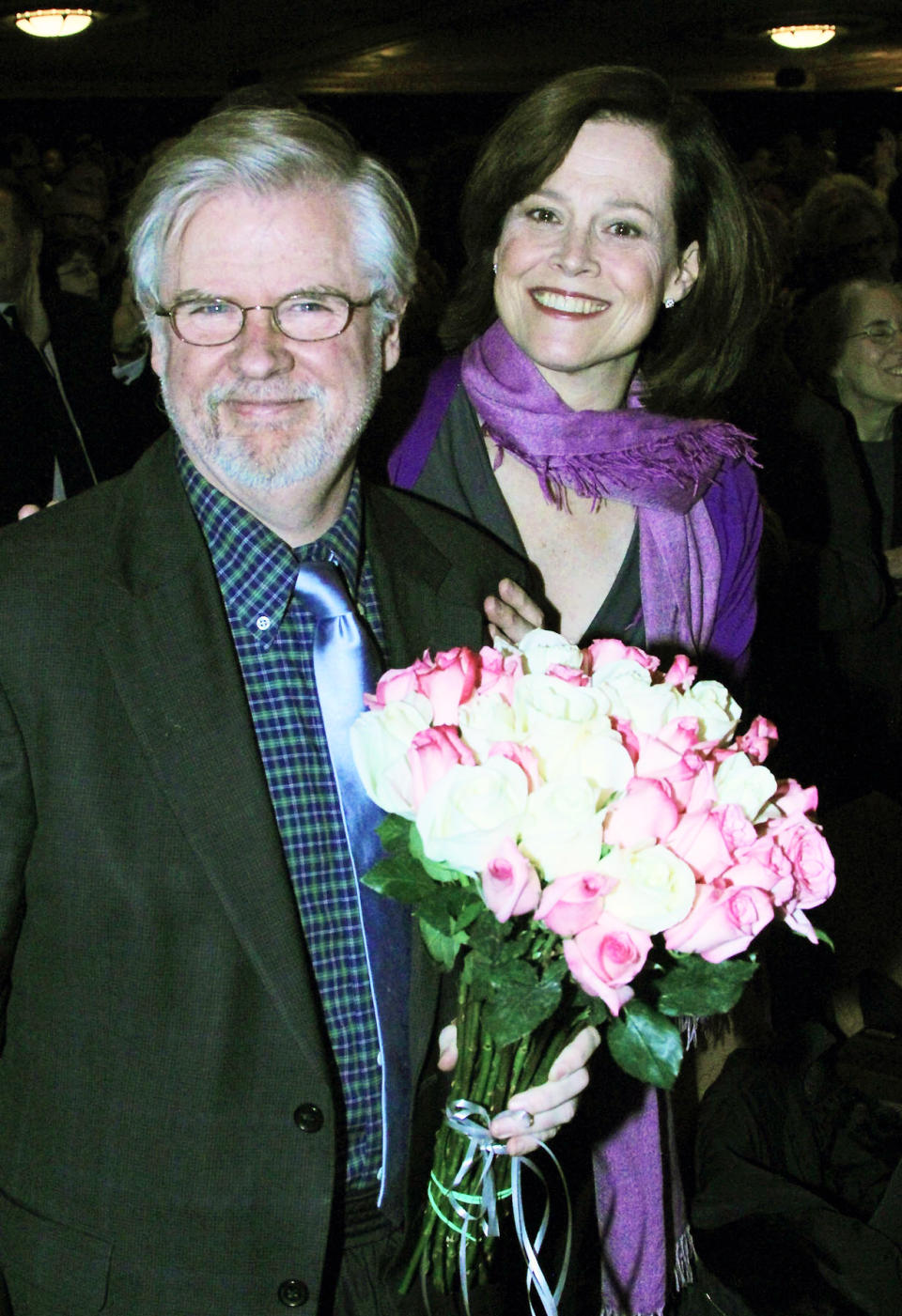 This publicity image released by The O + M Company shows playwright Christopher Durang, left, with actress Sigourney Weaver at curtain call on opening night of "Vanya and Sonia and Masha and Spike". (AP Photo/The O + M Company, Bruce Glikas)