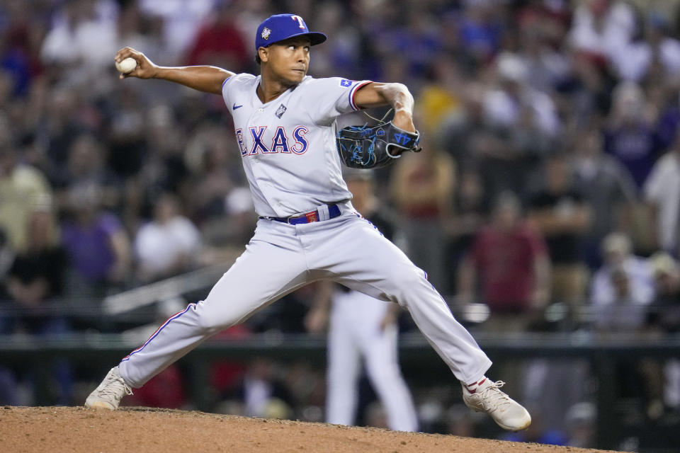 Texas Rangers relief pitcher Jose Leclerc throws against the Arizona Diamondbacks during the ninth inning in Game 4 of the baseball World Series Tuesday, Oct. 31, 2023, in Phoenix. (AP Photo/Godofredo A. Vásquez)