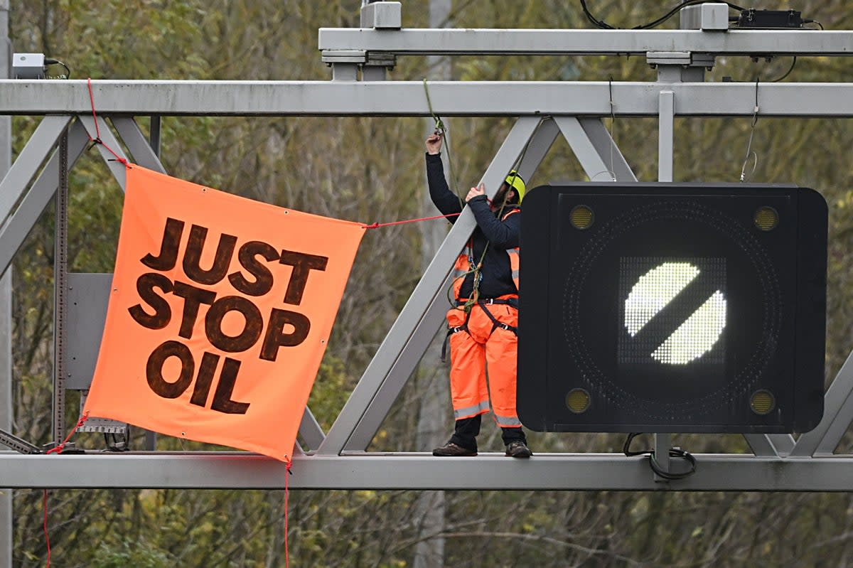 Just stop Oil blocking the M25 after scaling a gantry as part of a series of protests (Getty Images)