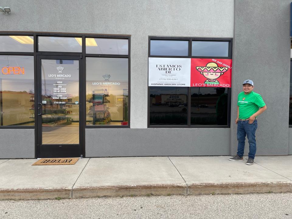 Eduardo Hernandez stands in front of Leo's Mercado, a Hispanic specialty store he and his wife, Salina, opened in Marinette.