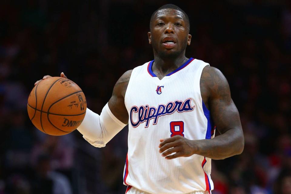 <p>Victor Decolongon/Getty</p> Nate Robinson playing a game as part of the Los Angeles Clippers on March 17, 2015