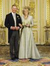 <p>With Prince Charles on their wedding day. The couple were legally married in <a href="https://www.townandcountrymag.com/society/tradition/g26236519/best-royal-weddings-around-the-world" rel="nofollow noopener" target="_blank" data-ylk="slk:a small civil ceremony;elm:context_link;itc:0;sec:content-canvas" class="link ">a small civil ceremony</a> at the Windsor Guildhall (presumably to avoid controversy over the heir to the throne marrying a divorcee in a religious ceremony) followed by a marriage blessing at St. George's Chapel and reception <a href="https://www.townandcountrymag.com/society/tradition/g15881437/royal-weddings-history-windsor-castle-st-georges-chapel" rel="nofollow noopener" target="_blank" data-ylk="slk:inside Windsor Castle.;elm:context_link;itc:0;sec:content-canvas" class="link ">inside Windsor Castle.</a></p>