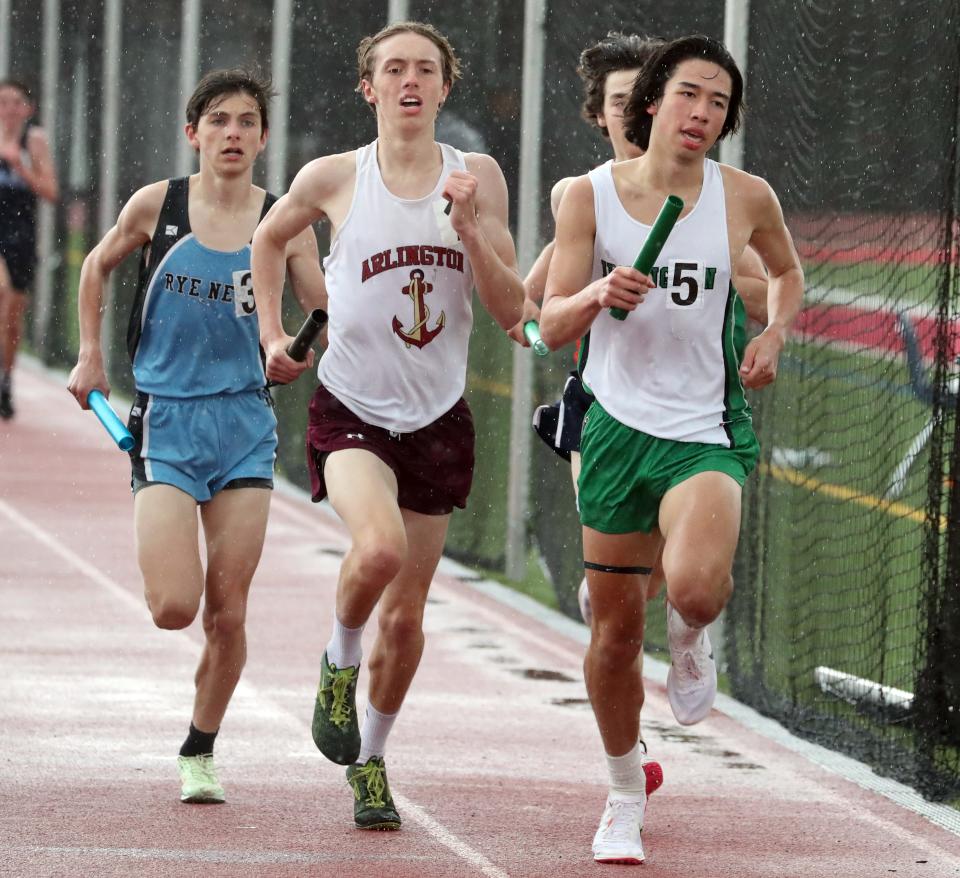 Irvington's Max Shevrin, right, runs the first leg of the winning 4x1600 relay at the Somers Joe Wynne track and field invitational May 6, 2022.