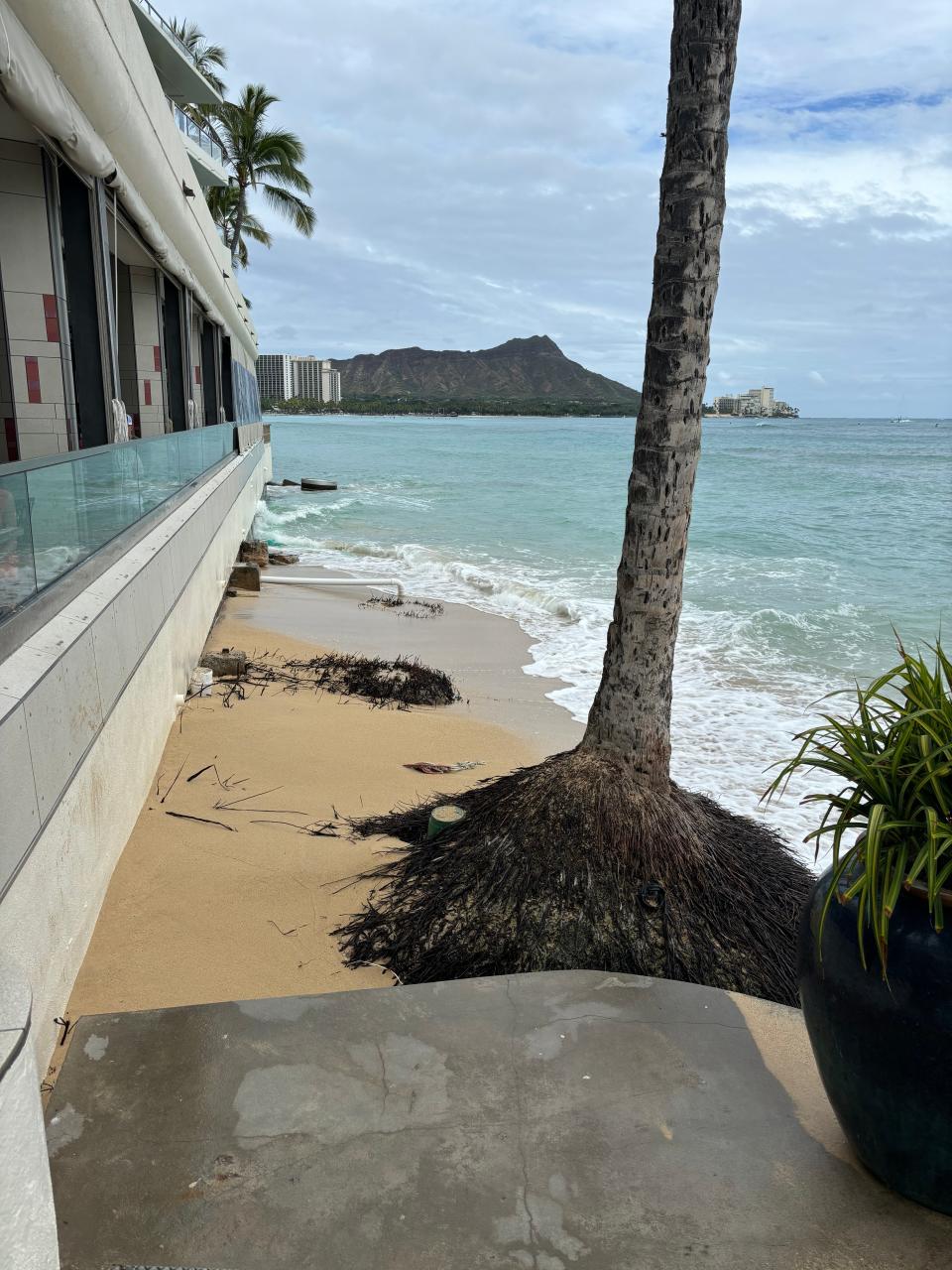 The beach in front of the OUTRIGGER Reef Waikiki Beach Resort was a small pocket of sand but is virtually gone.