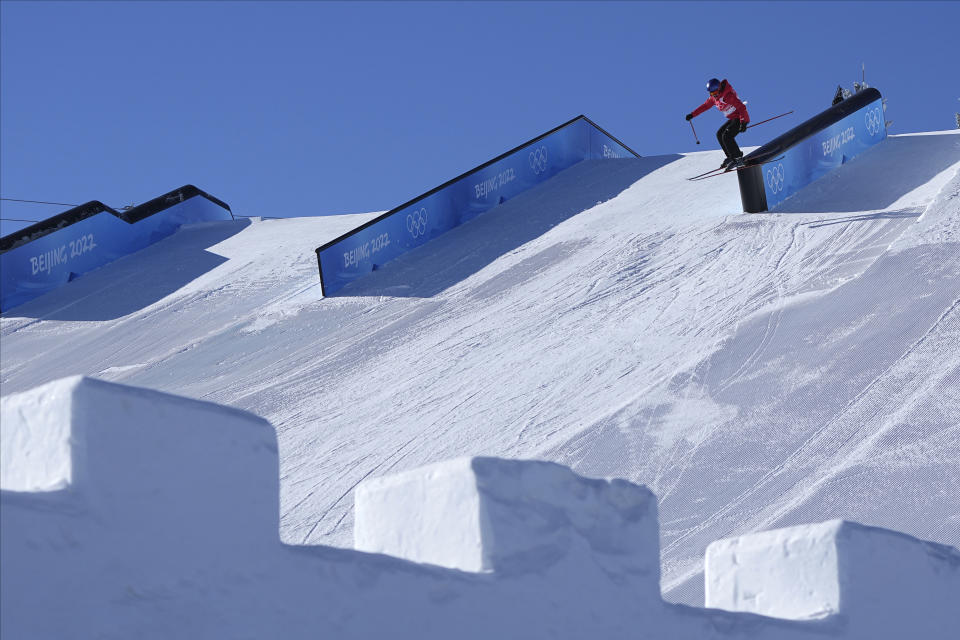 China's Eileen Gu competes during the women's slopestyle qualification at the 2022 Winter Olympics, Monday, Feb. 14, 2022, in Zhangjiakou, China. (AP Photo/Gregory Bull)