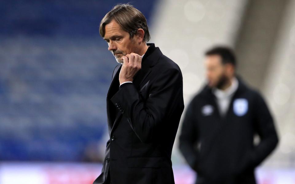 Derby County manager Phillip Cocu appears dejected during the Sky Bet Championship match at The John Smith's Stadium, Huddersfield - PA