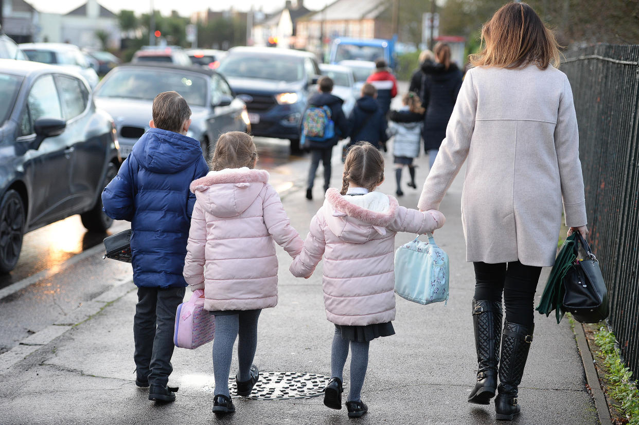 File photo dated 17/01/20 of parents walking their children to school in Hornchurch, Essex. The Government is being urged to put family at the centre of policy-making, as the Children's Commissioner for England published a key report on the make-up of UK families. Issue date: Thursday September 1, 2022.