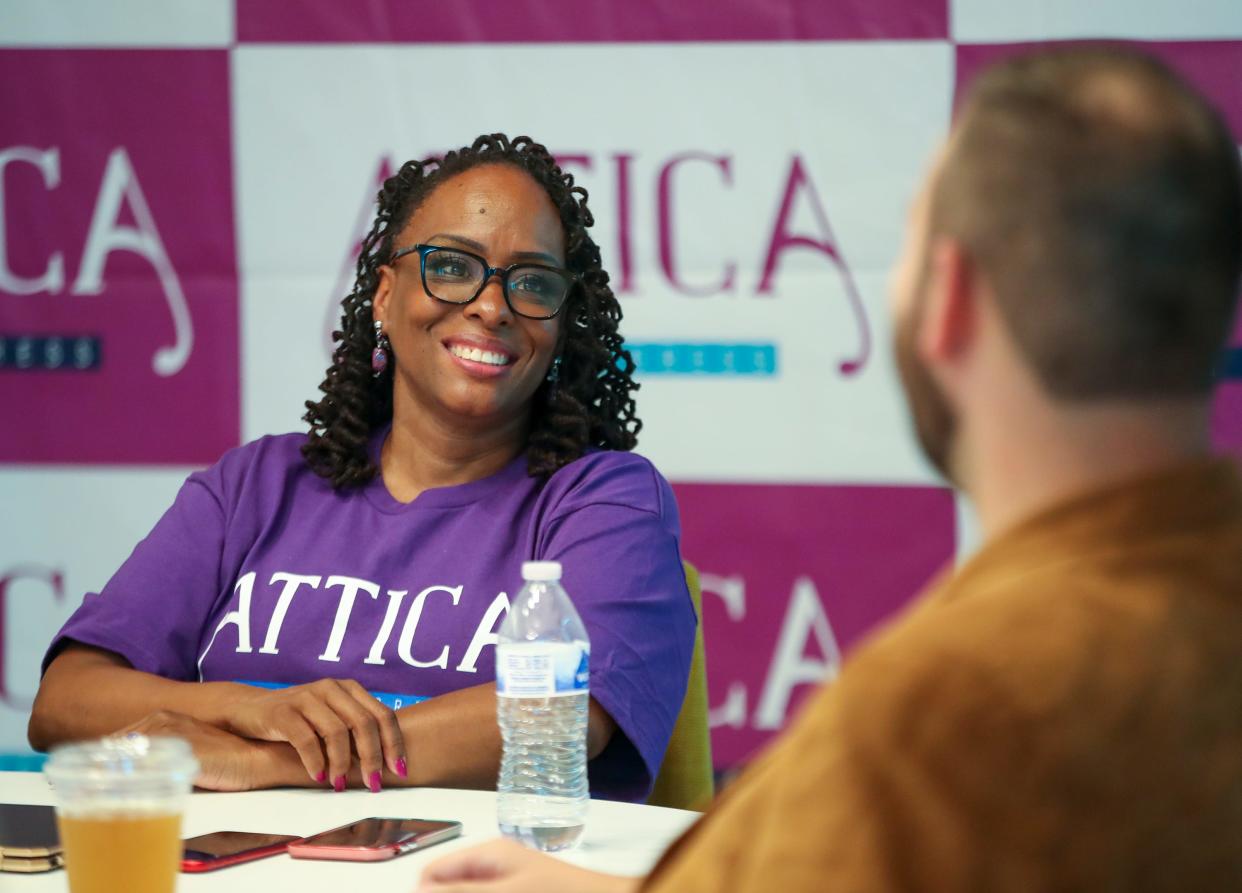 Former state Rep. Attica Scott, then a candidate in a primary for a seat in the U.S. House of Representatives, speaks at a July 2021 forum. Scott is running against Gerald Neal for a state Senate seat this spring.