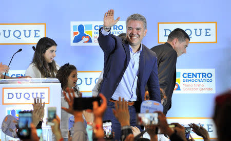 Ivan Duque, presidential candidate of the Centro Democratico party gives a speech after knowing the results of the legislative elections in Bogota, Colombia March 11, 2018. REUTERS/Carlos Julio Martinez