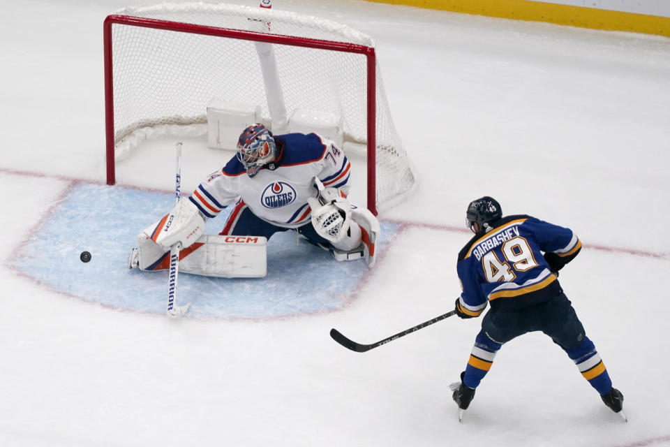 St. Louis Blues' Ivan Barbashev (49) is unable to score past Edmonton Oilers goaltender Stuart Skinner (74) during the third period of an NHL hockey game Wednesday, Oct. 26, 2022, in St. Louis. (AP Photo/Jeff Roberson)