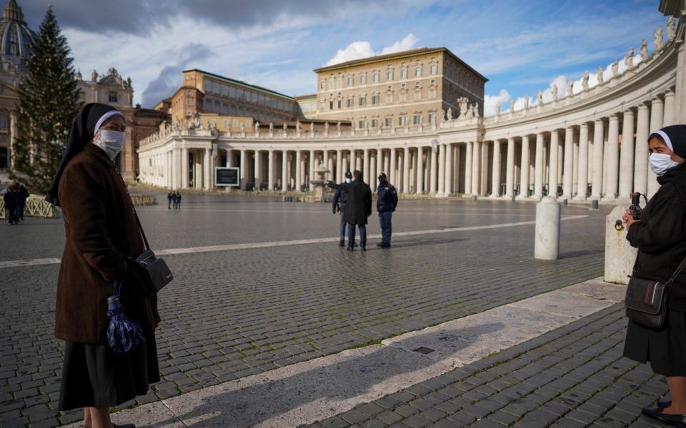 Nuns in an almost deserted St Peter's Square, January 2021 - Andrew Medichini/AP