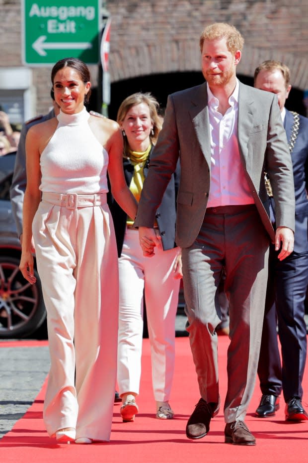 Meghan Markle in a White Brandon Maxwell Belted Jacket at the