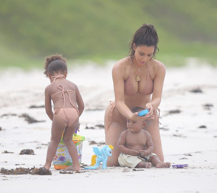 Kim Kardashian enjoyed her summer vacation with baby Saint and North West as they all play in the sand together at at Casa Aramara in Punta Mita Mexico