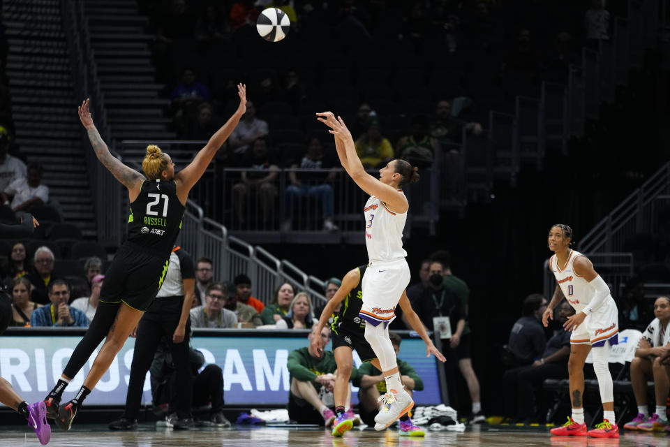 Phoenix Mercury guard Diana Taurasi shoots against Seattle Storm center Mercedes Russell (21) during the first half of a WNBA basketball game Tuesday, June 4, 2024, in Seattle. (AP Photo/Lindsey Wasson)