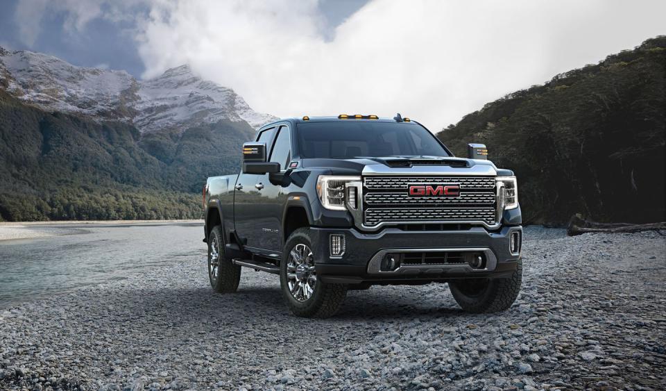 <p>The GMC has extra chrome and in-your-face grille compared with the Chevy, but its 35,500-pound max towing capacity remains intact.</p>