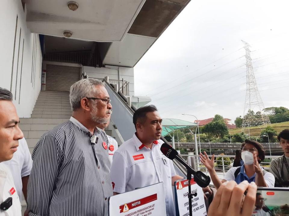 Press conference by former transport minister Anthony Loke and Pakatan Harapan election candidates Fahmi Fadzil, Khalid Samad, Zahir Hassan, and Rajiv Rishyakaran at Universiti LRT station on the one-week shutdown of 16 LRT stations in Universiti LRT station. Nov 9, 2022. — Picture by Ida Lim