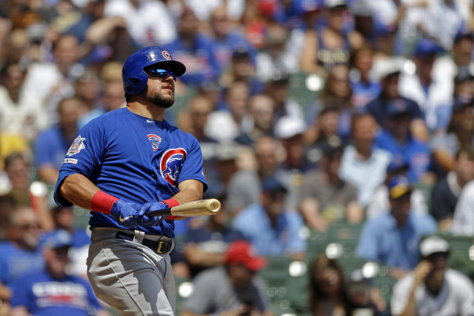 Chicago Cubs' Kyle Schwarber watches his grand slam during the second inning of baseball game against the Milwaukee Brewers Sunday, July 28, 2019, in Milwaukee. (AP Photo/Aaron Gash)