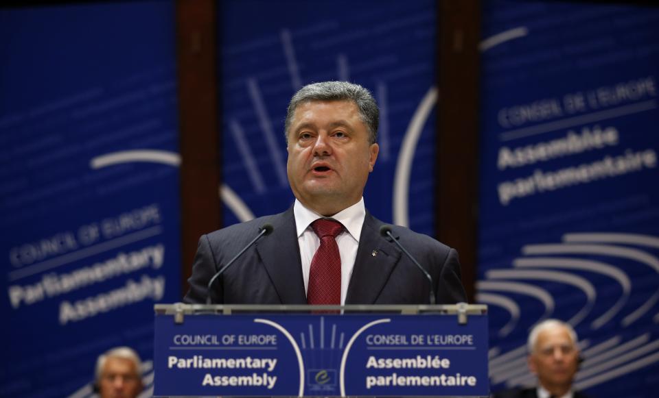 Ukraine's President Petro Poroshenko addresses the Parliamentary Assembly of the Council of Europe in Strasbourg, June 26, 2014. REUTERS/Vincent Kessler (FRANCE - Tags: POLITICS)