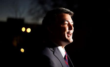 Cory Gardner, Republican U.S. Senate candidate talks to a guest at the Hispanic Chamber of Commerce of Metro Denver event in Denver in this October 24, 2014 file photo. REUTERS/Rick Wilking/Files