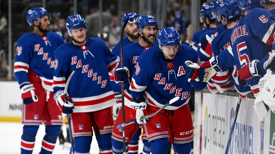 Mar 21, 2024; Boston, Massachusetts, USA; New York Rangers left wing Artemi Panarin (10) celebrates with his teammates after scoring a goal against the Boston Bruins during the third period at the TD Garden. 