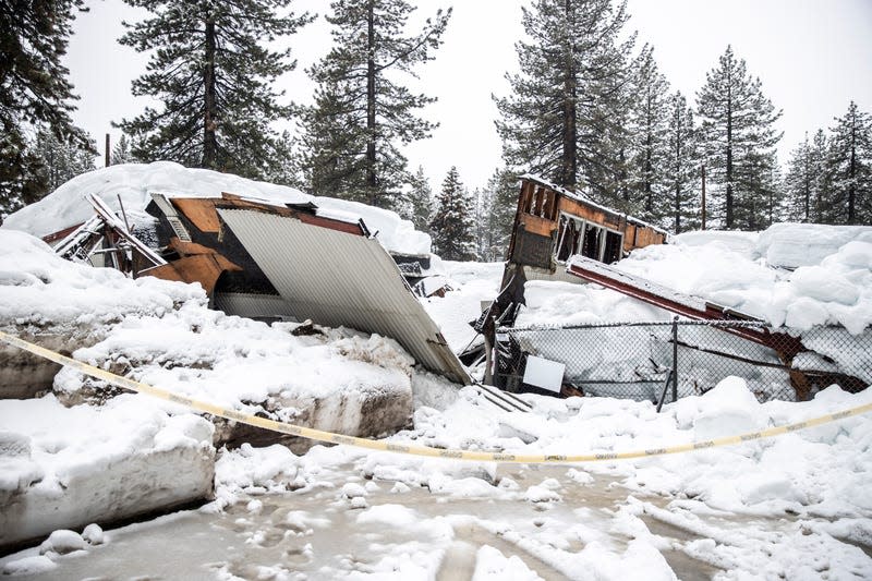 Photo of collapsed building under snow