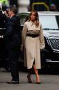 For a meeting with Prime Minister Theresa May on the second day of the UK state visit, Melania Trump dressed for the British rain in a belted trench coat by Céline she's worn before. The First Lady finished the camel number with the controversial Manolo Blahnik heels she wore to help out with the Hurricane Harvey relief efforts and a matching Hermès bag. [Photo: Getty]