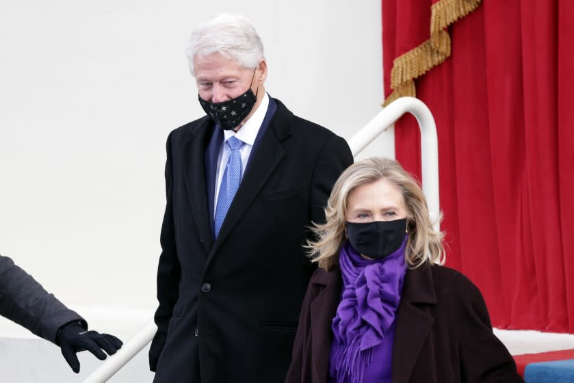 WASHINGTON, DC - JANUARY 20: Former U.S. President Bill Clinton arrives with former Secretary of State Hillary Clinton to the inauguration of U.S. President-elect Joe Biden on the West Front of the U.S. Capitol on January 20, 2021 in Washington, DC. During today's inauguration ceremony Joe Biden becomes the 46th president of the United States. (Photo by Alex Wong/Getty Images)