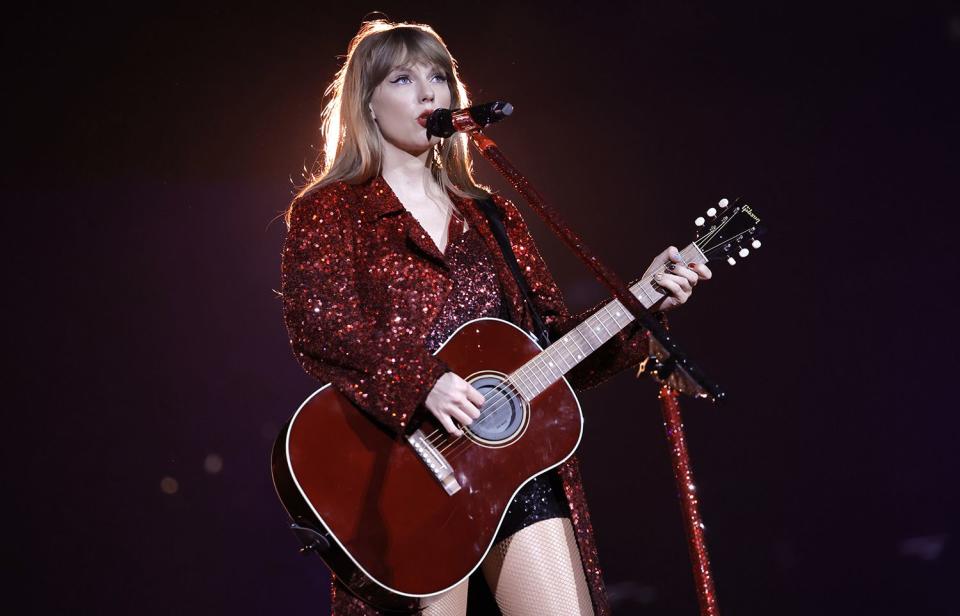 <p>Kevin Winter/Getty Images for TAS Rights Management</p> Taylor Swift performing at the Eras Tour in August.