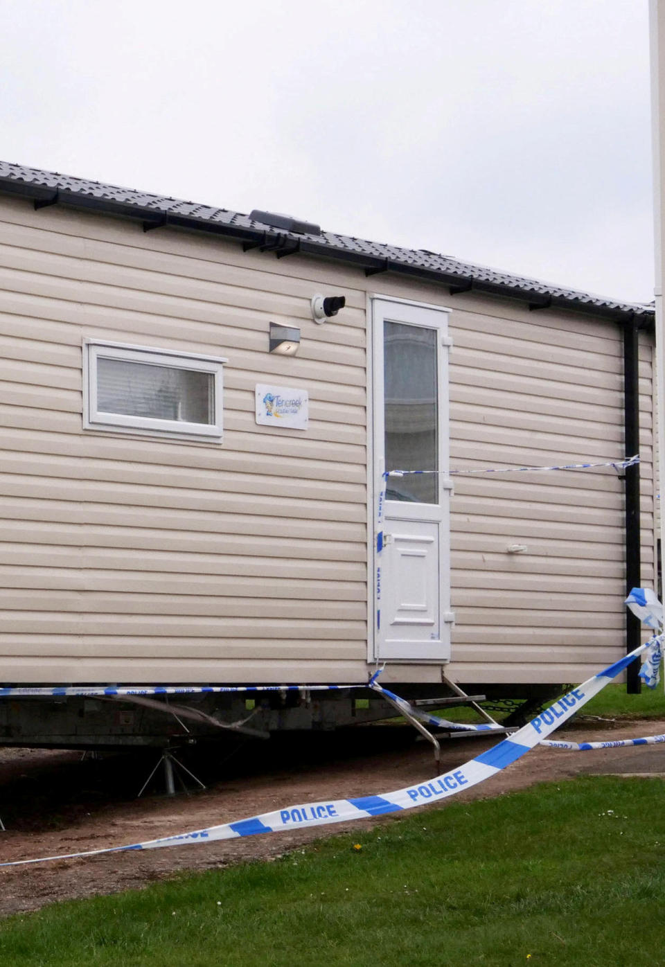 Police taped off a large area around static caravans at the Tencreek Holiday Park. (SWNS)