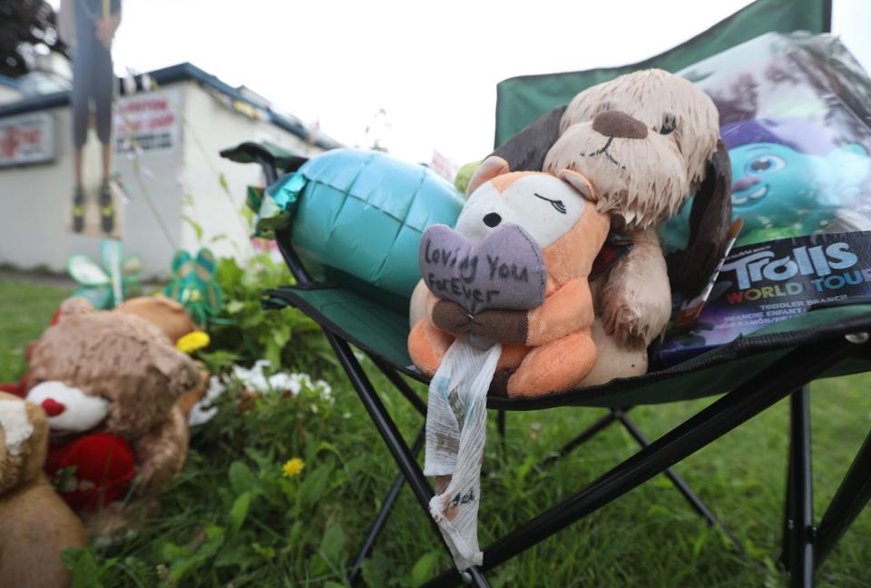 Stuffed animals, photos and candles in memory Ryan Grantham Jr., 6, who was struck by a vehicle on Thurston Road in Rochester on June 23 and died.