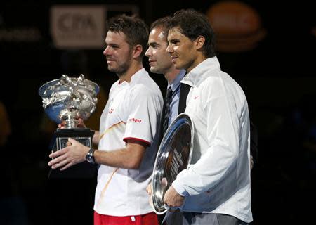 Rafael Nadal of Spain (R), Stanislas Wawrinka of Switzerland and Pete Sampras of the U.S. (C) pose during the prize ceremony after the men's singles final match at the Australian Open 2014 tennis tournament in Melbourne January 26, 2014. REUTERS/Bobby Yip