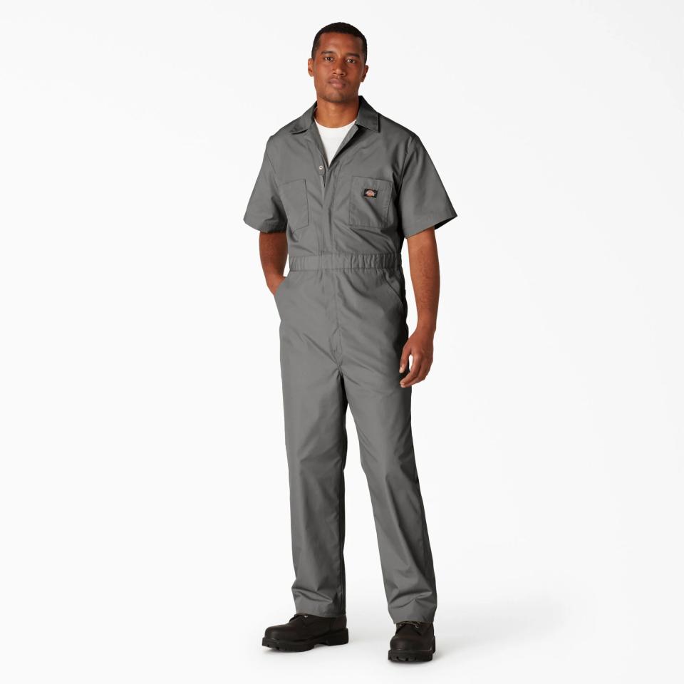 Model wearing Dickies short-sleeve coveralls