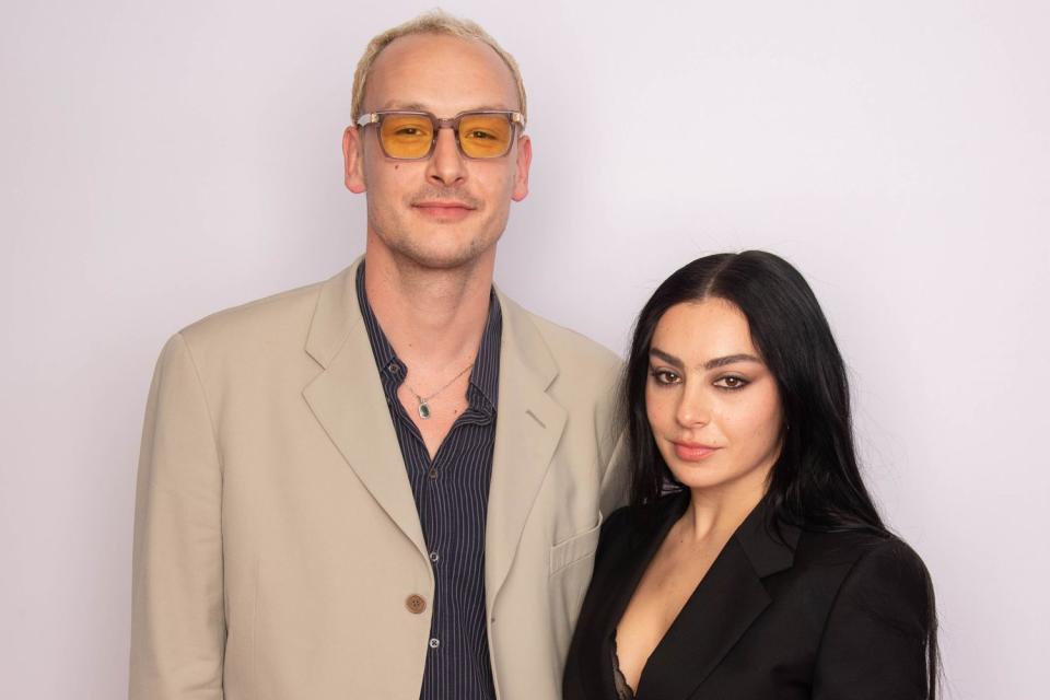 <p>Dave Hogan/Hogan Media/Shutterstock </p> George Daniel and Charli XCX in London in May 2023