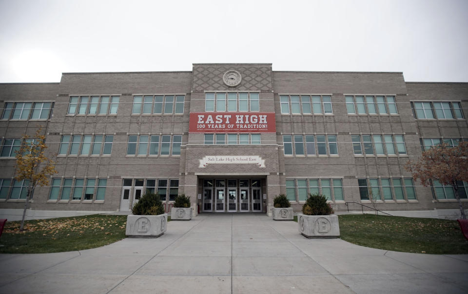 This Oct. 28, 2019 photo, shows the facade of East High School in Salt Lake City. The iconic filming location of Disney's High School Musical still stands as a typical American high school, with a not-so-typical draw from tourists. (Kristin Murphy/The Deseret News via AP)