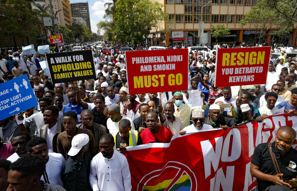 People hold placards as they chant slogan during a protest against a ruling by the Kenya supreme court for upholding the National Gay and Lesbian Human Rights Commission (NGLHRC) to register the association in Nairobi, Friday Oct. 6 2023. The protests took place after the Friday prayers with demonstrator’s calling out Kenya’s highest court for “condoning immorality.” (AP Photo/Brian Inganga)