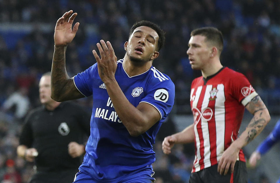 Cardiff City's Nathaniel Mendez-Laing reacts after a missed shot on goal, during the English Premier League match between Cardiff City and Southampton at the Cardiff City Stadium, in Cardiff, Wales, Saturday Dec. 8, 2018. (Mark Kerton/PA via AP)