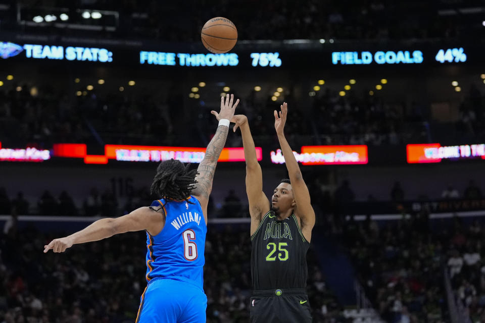 New Orleans Pelicans guard Trey Murphy III (25) shoots against Oklahoma City Thunder forward Jaylin Williams (6) in the first half of Game 4 of an NBA basketball first-round playoff series in New Orleans, Monday, April 29, 2024. (AP Photo/Gerald Herbert)