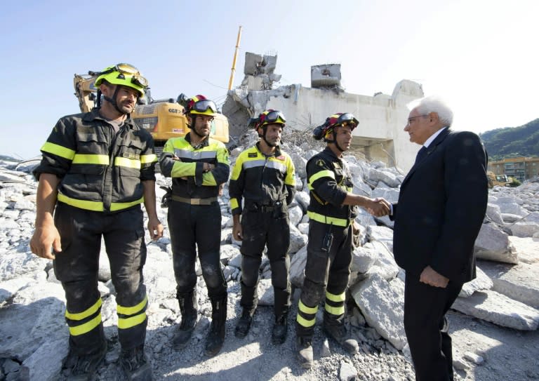 Italian President Sergio Mattarella (R) visited the disaster site before attending the state funeral on Saturday