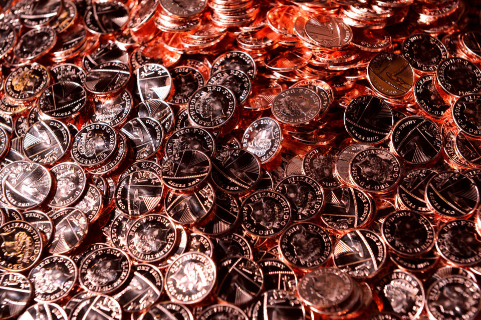 New pennies come off the production line at the Royal Mint. Photo: Joe Giddens/PA Wire  
