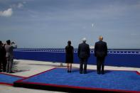 FILE PHOTO: U.S. President Trump watches the launch of a SpaceX Falcon 9 rocket and Crew Dragon spacecraft, from Cape Canaveral, Florida