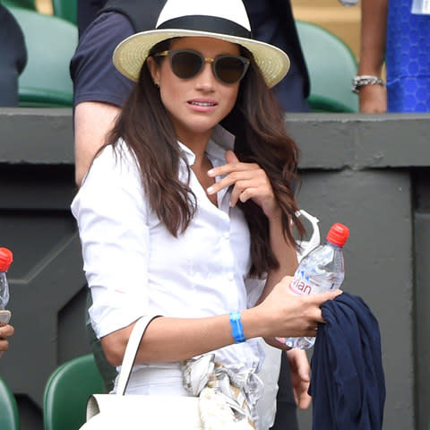 Meghan Markle at Wimbledon this summer while visiting the Prince - Credit: Karwai Tang