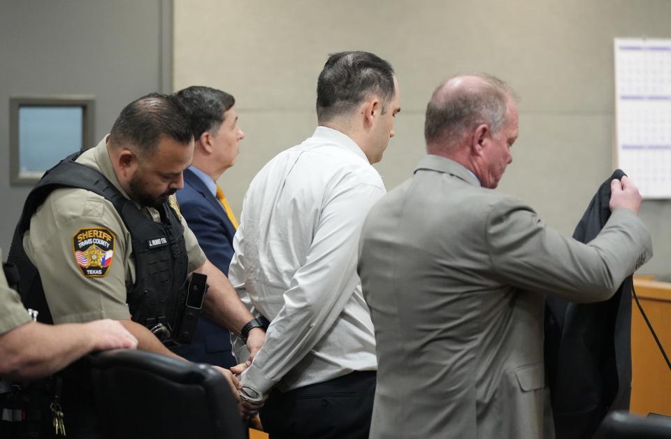 Daniel Perry is handcuffed Friday after being convicted of murder in the 2020 killing of Austin protester Garrett Foster.